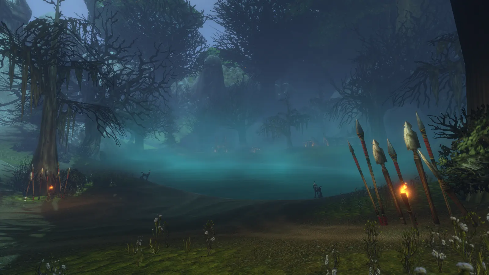 A dark, misty forest lit by blue light in Shen'dralas, the new zone between Mulgore and Desolace